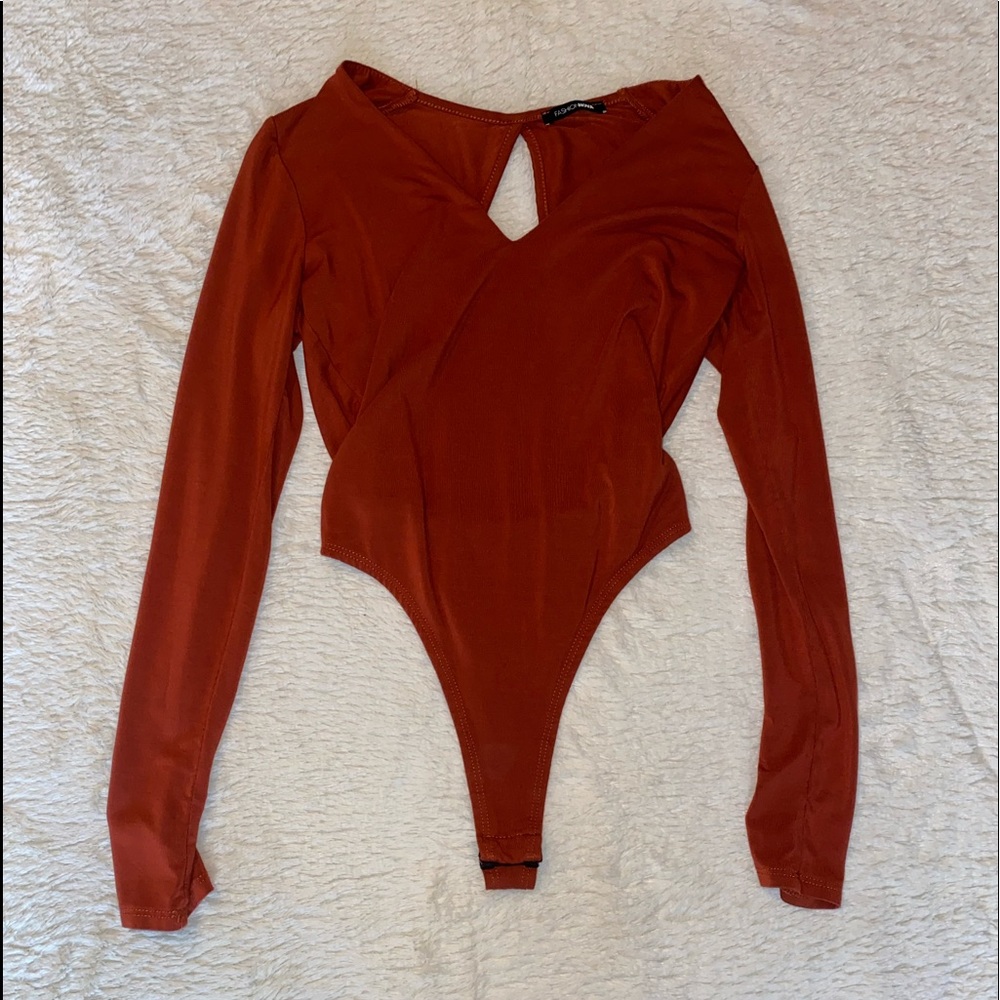 Red/orange open back body suit